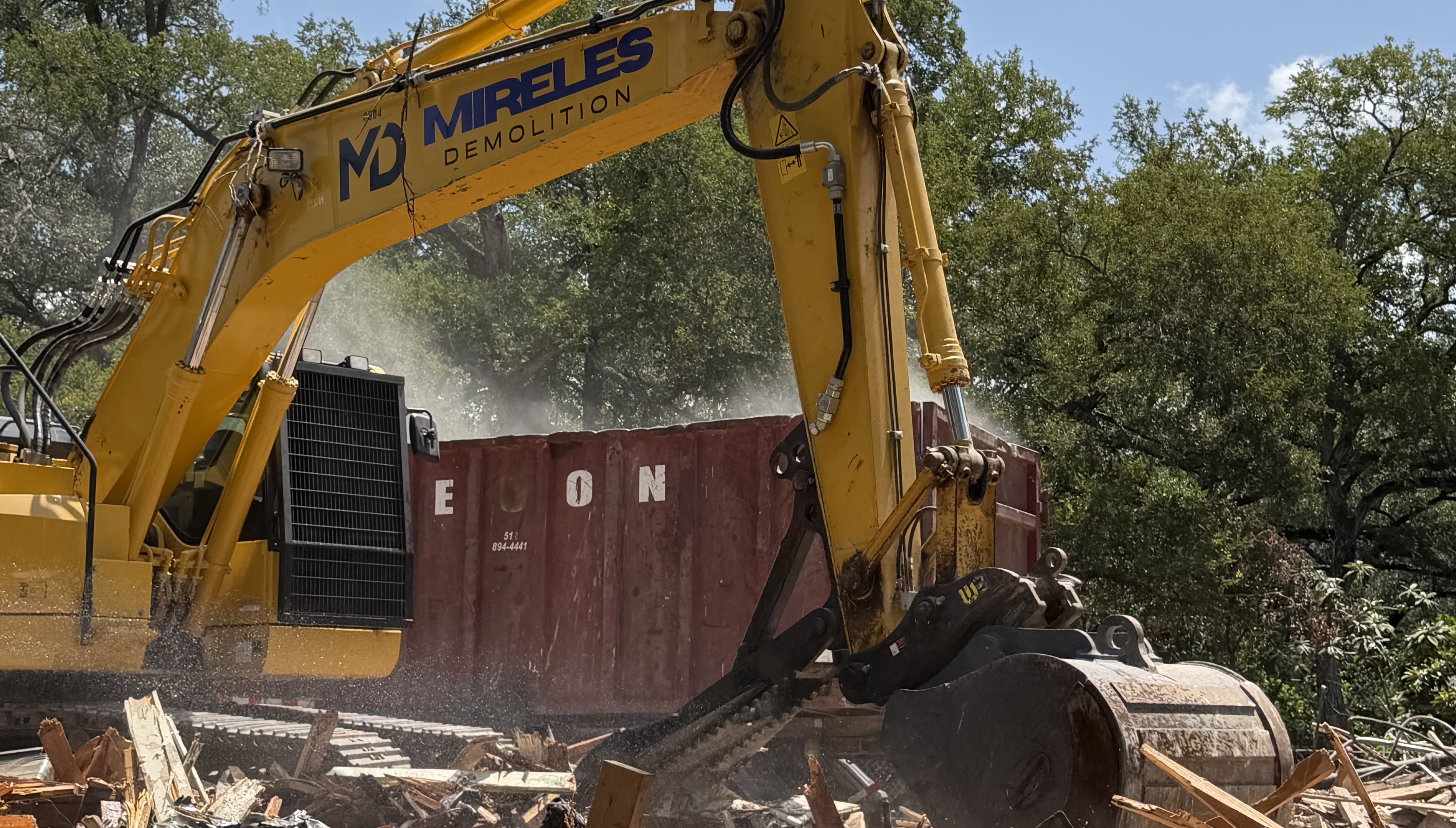 Mireles Demolition excavator at work on a jobsite