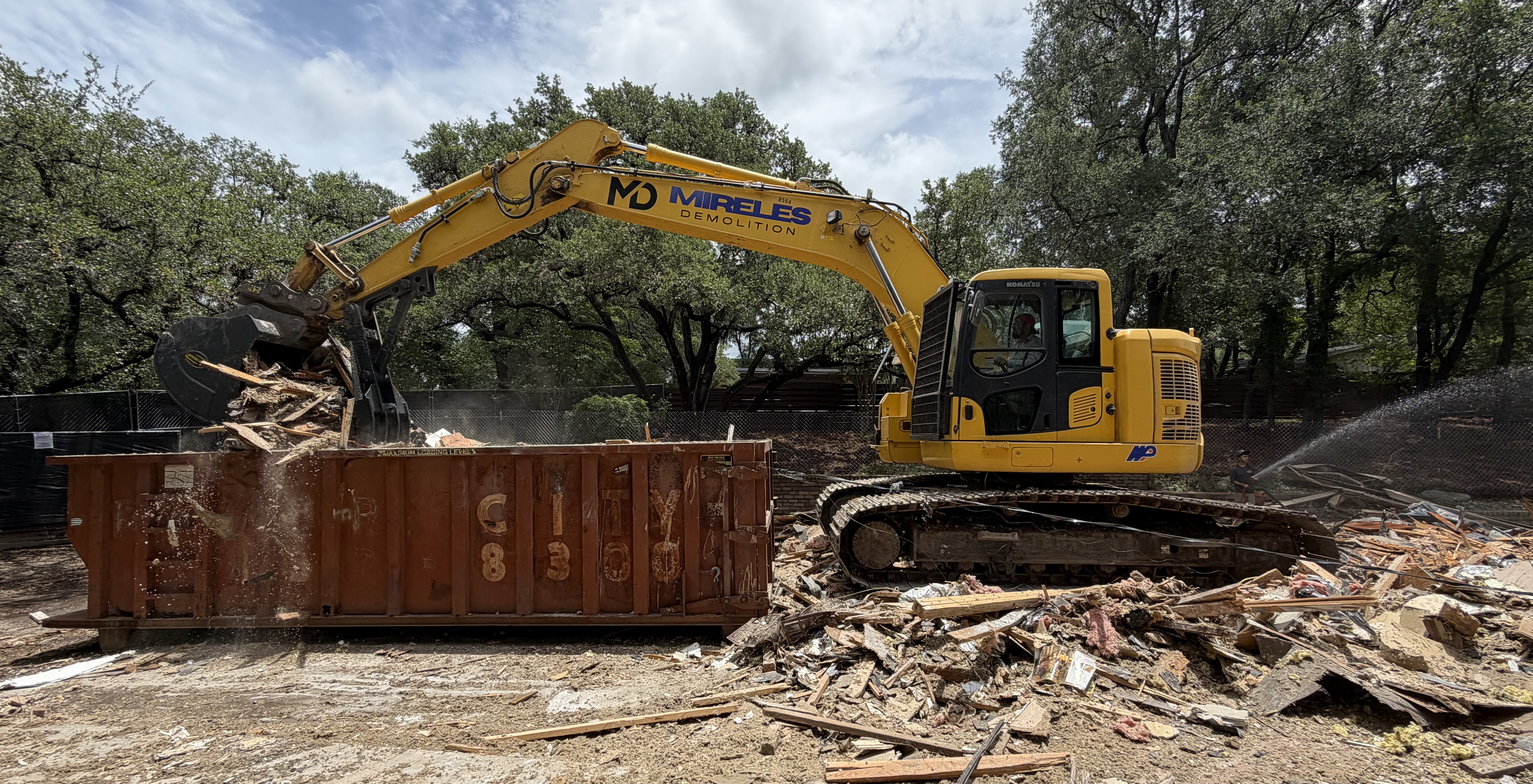 Mireles Demolition excavator handling demolition debris
